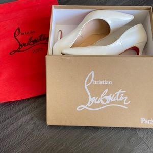 Christian Louboutin “So Kate” heels. Worms a few times.